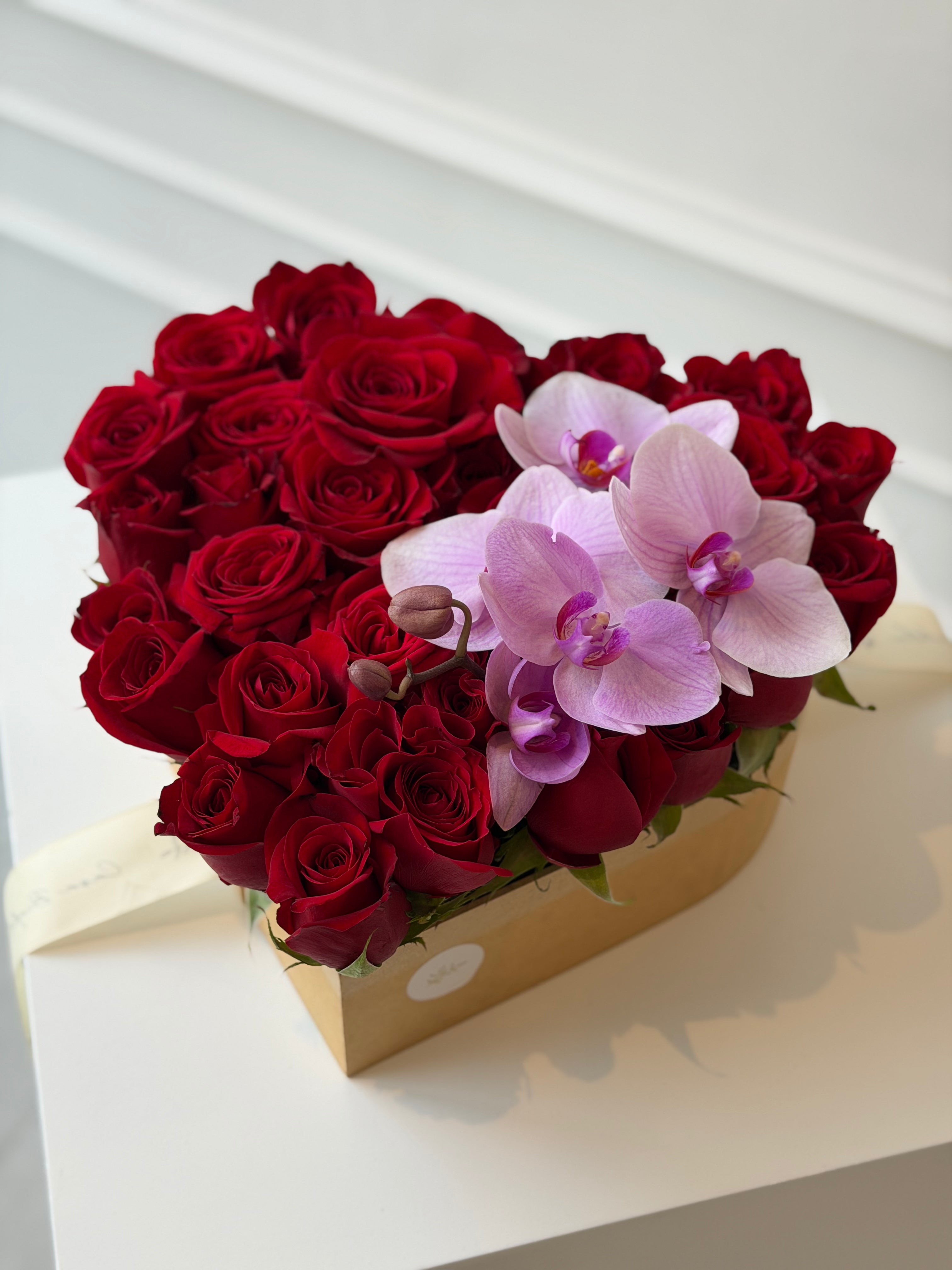 Corazón de rosas rojas